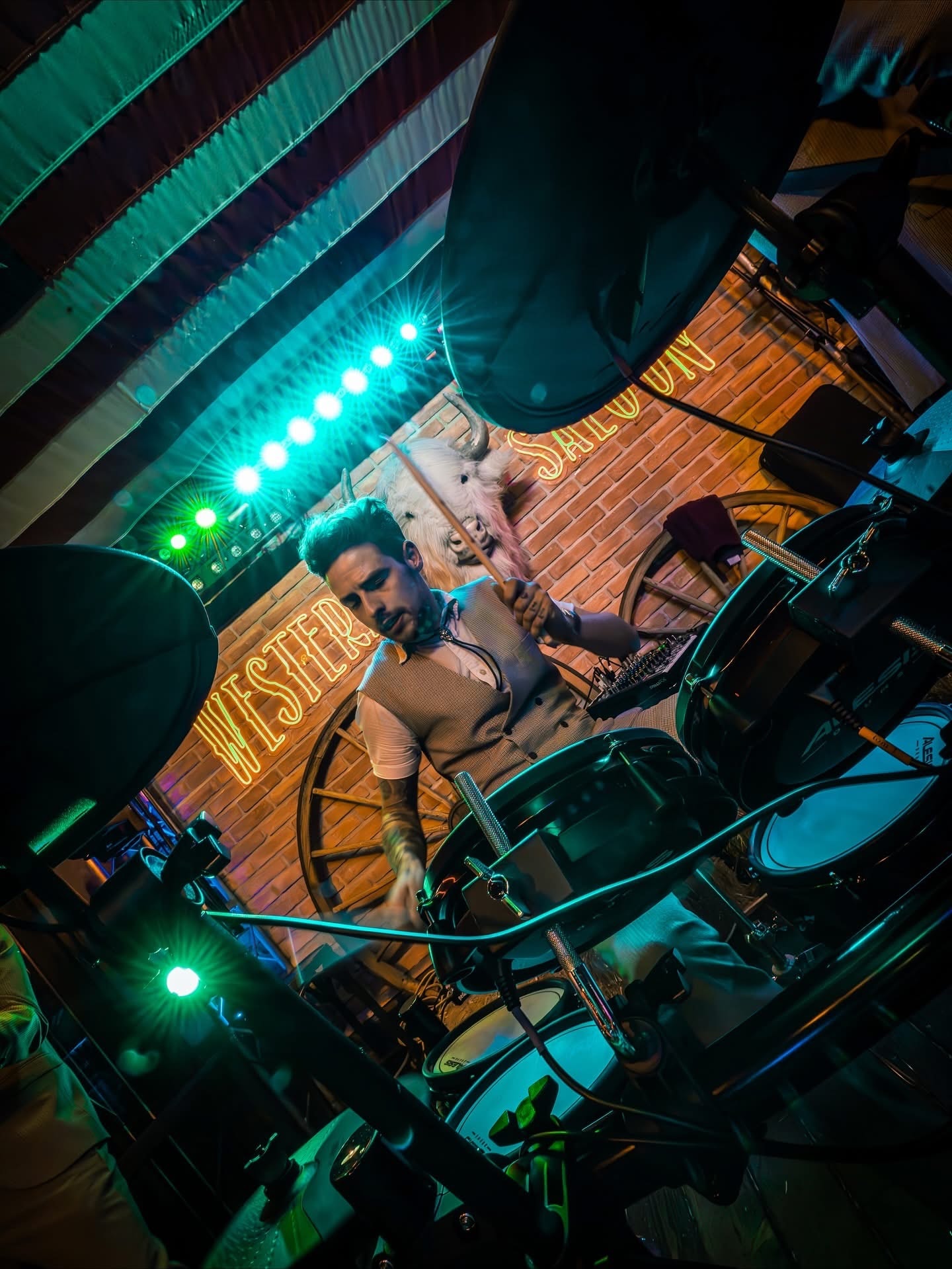 Drummer performing at the Western Saloon