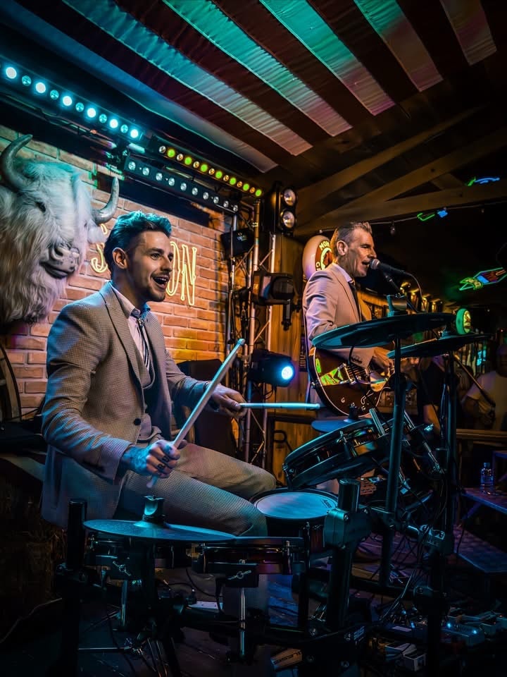 Drummer and guitarist at the Western Saloon