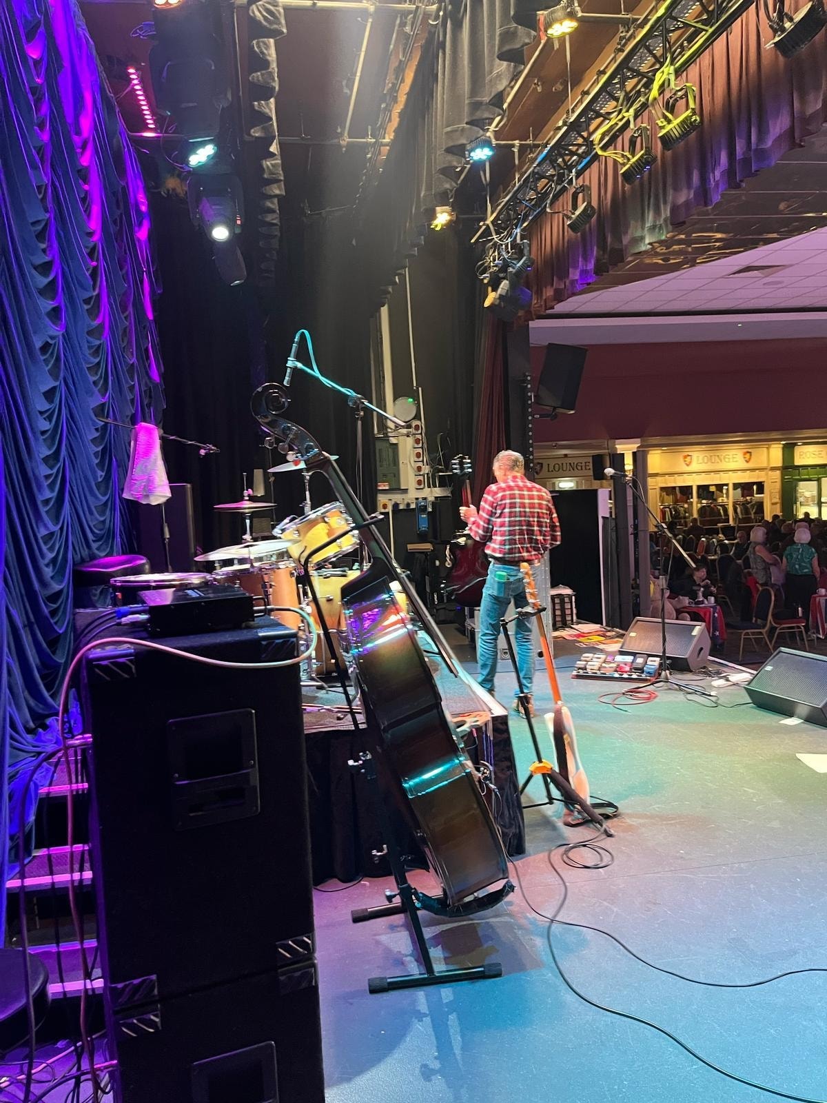Rock and roll band performing live on stage